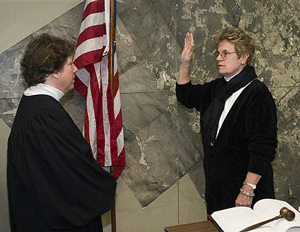 Justice Schneer swearing in Supervisor Duke